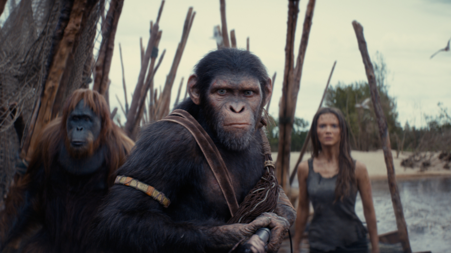 (L-R): Raka (played by Peter Macon), Noa (played by Owen Teague) , and Freya Allan as Nova in 20th Century Studios' KINGDOM OF THE PLANET OF THE APES. Photo courtesy of 20th Century Studios. © 2024 20th Century Studios. All Rights Reserved.