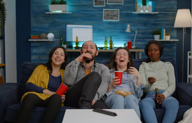 Multiethnic friends laughing while watching comedy movie enjoying time spend together. Excited mixed group of people eating snacks, drinking beer having fun late at night during relaxed party SSUCv3H4sIAAAAAAAACnRVyY7jNhD9FYFns8F98S3JTGdBkMwhQA7jYECRlC20JBpaOhkY/e8pUp4euZeLINXCqnrF93RBtZtaj/YX1HbdMs2jm9s0oD3ZoTEOIY7l9XHkipS3GNo5ja3rylftZn8aXB/Rfli67mmHptnNyxSnfGKfpvl8SnOCL7pDLqQ6TnPyD2jP9A6FMbp+mtucnb/r9li8JQXt+Q5RxsdmdU6nZZ7jeE0Hn+tc/3X1ndMQ5PrqU5eWsU7/lYp9ysPELvZxmKeSFr/G2Bend8O2XDkov4ZliCU0xHOa2ucJmIbxvJvjEeZfB7xi9/mS7WiPfh2gxTaNE4KGlxos98s4tPMyRvS0+xZ1n1Ko3BCqD2M7PHwPBTN6+gcmO8bBw2iXJyg4Qveu4PkZMSoVFbHBTAaNhQ4UO8U0VpI7JWOQyho4znHppdQNJtpaLFQQ2DrhMWmioMxaDtkQZixvpPAK1w4iBG0kdvDEjDJtdV0rLXIYpEtNrcHMO44FYQQbqwN2XFMWauZoaCBMNqKG5gL2Eg4SsjbYGXhEFwhX3lovBYQF2igvqMRSUoZFYDUUjRaToEVDad2oQHJRTwhtAtQLzMODamyNjpg4GyN3givWIIDq4V8AvM+7AKjcElpY5AU9Ju+6vG4wnsfWt8NxjUjzKV9oWERahnkEjBEU61I6u7qDpTeQFnfo5KYJAsLVkNcOzEj9esiQ5ryOnBngNsAb5UxZwa2wxmhJGOPoGxFOLSTmQhe0nLvkQgyFGa0f03r7gHRwHRUDlLi2cO1uWJPtRlJLbulytWtjX9Fm67ryZ2u65dHWcyXU1nQl1ta0JdjG/JJpq08RLr5TbjUxzV9xr7is1Fa9Yl12aUqpUFlclrpvof2C4VZO3h/aUvYmdMV+M9/a7DuDlK63CAGN9DvgX11vzCi0kkbe6Ew2SyAD0e+Nbt9cG6WSSamyRBRjG6aXoCDBGTNwOSV6RgWgcMc0eRgcMGGUSEKEyPd1ixEojSEc5CQLwBUkRCVXkipO0WuUEFUGUuAf8YwSaqICojcBE6JBrahvcC19jS0DmfEsH/0CPSSoVdIakku8gA9ZBiwwqrR6ixMSmkgLYqdAZFELlwM5SkOtQDqU8yAzzFJseGhAuWwjuJfGNLnVlZL5+EzsJo19EejRTYB1UQYQkrObT2D8uD8c6F31dxofQE+qT6X44QCl76r7j9WP3RKr39vH7MPVPfwhhjBVv7jhmC1/LnP1R3s8zdVfAHA56APgdzj8QKz6AopBKJfmy0+wpTtCGVGgIne/ffoZPf0PAAD//wMAB+n1SaEHAAA=