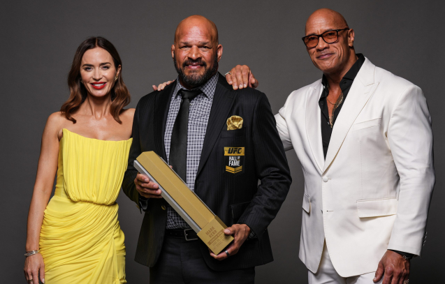 LAS VEGAS, NEVADA - JUNE 26: (L-R) Emily Blunt, Mark Kerr and Dwayne Johnson pose for a portrait backstage during the UFC Hall of Fame Class of 2025 Induction Ceremony at T-Mobile Arena on June 26, 2025 in Las Vegas, Nevada. (Photo by Mike Roach/Zuffa LLC)