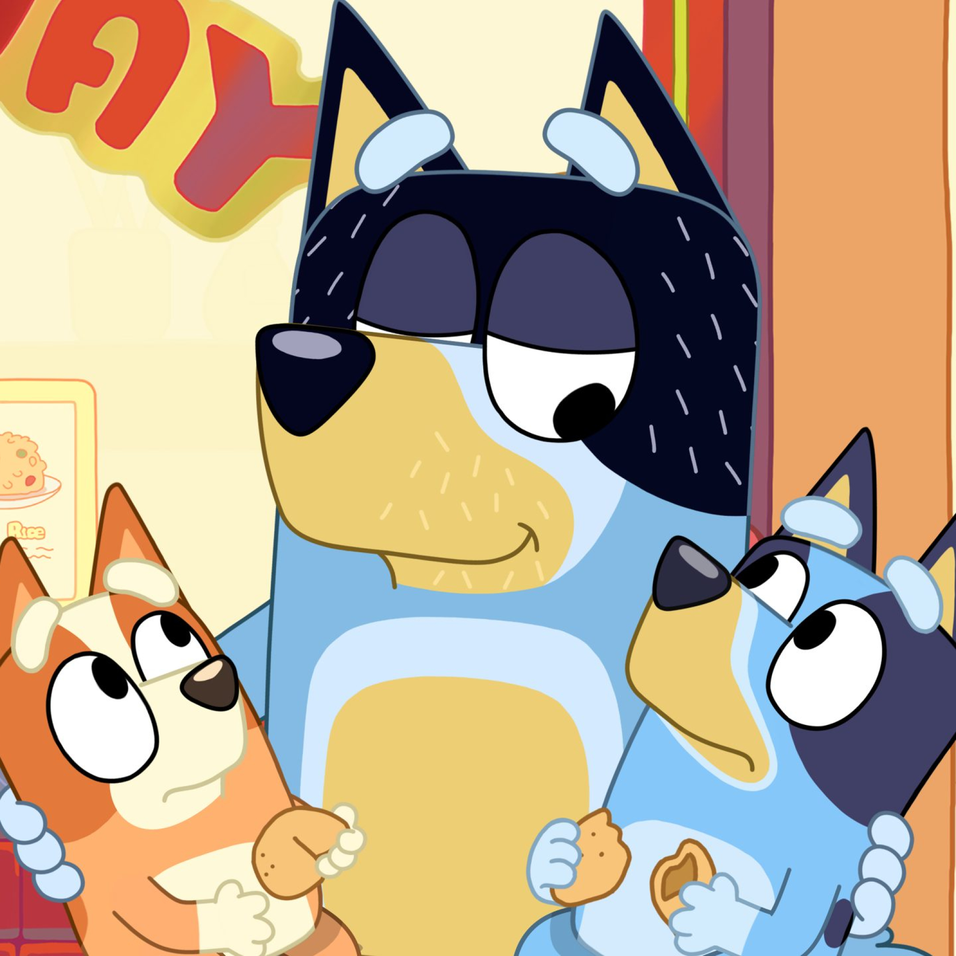 Dad shares a moment with Bingo and Bluey after reading the fortune cookie message