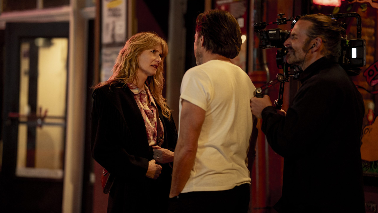 Laura Dern and Will Arnett with director Bradley Cooper on the set of IS THIS THING ON? Photo by Searchlight Pictures/Jason McDonald, Courtesy of Searchlight Pictures. © 2025 Searchlight Pictures All Rights Reserved.