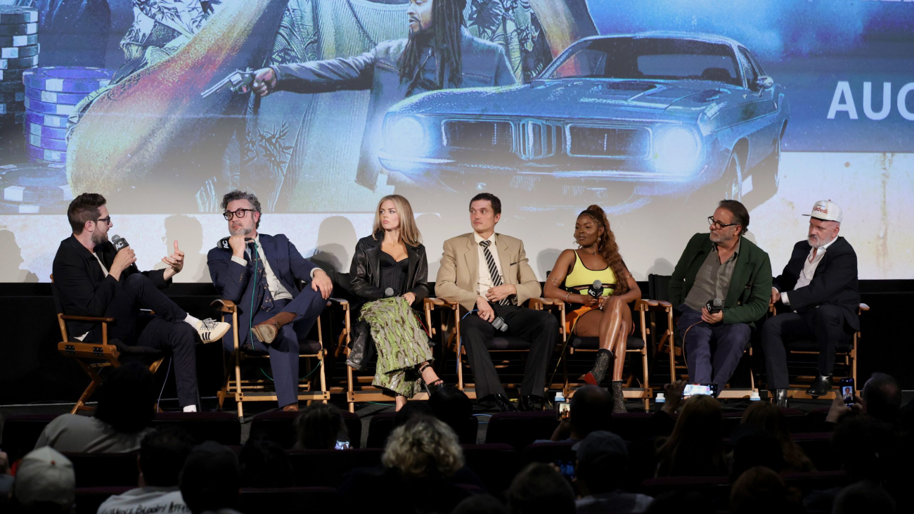 SANTA MONICA, CALIFORNIA - AUGUST 19: (L-R) (L-R) Kevin McCarthy, Shawn Simmons, Samara Weaving, Karl Glusman, Kyanna Simone Simpson, Andy García and Mike O'Malley speak onstage during the "Eenie Meanie" Launch event Q&A with Beyond Fest at the Aero Theatre in Santa Monica, California on August 19, 2025. (Photo by Jesse Grant/Getty Images for 20th Century Studios)
