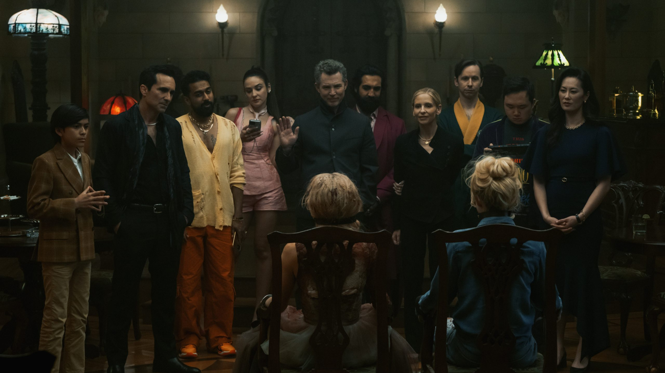 From L to R: Juan Pablo Romero, Nestor Carbonell, Varun Saranga, Maša Lizdek, Shawn Hatosy, Samara Weaving, Nadeem Umar-Khitab, Sarah Michelle Gellar, Daniel Beirne, Kathryn Newton, Antony Hall, and Olivia Cheng in READY OR NOT 2: HERE I COME. Photo by Searchlight Pictures/Pief Weyman, Courtesy of Searchlight Pictures. © 2026 Searchlight Pictures. All Rights Reserved.